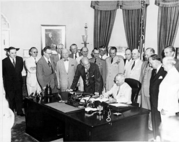 Truman signing National Security Act Amendment of 1949.jpg